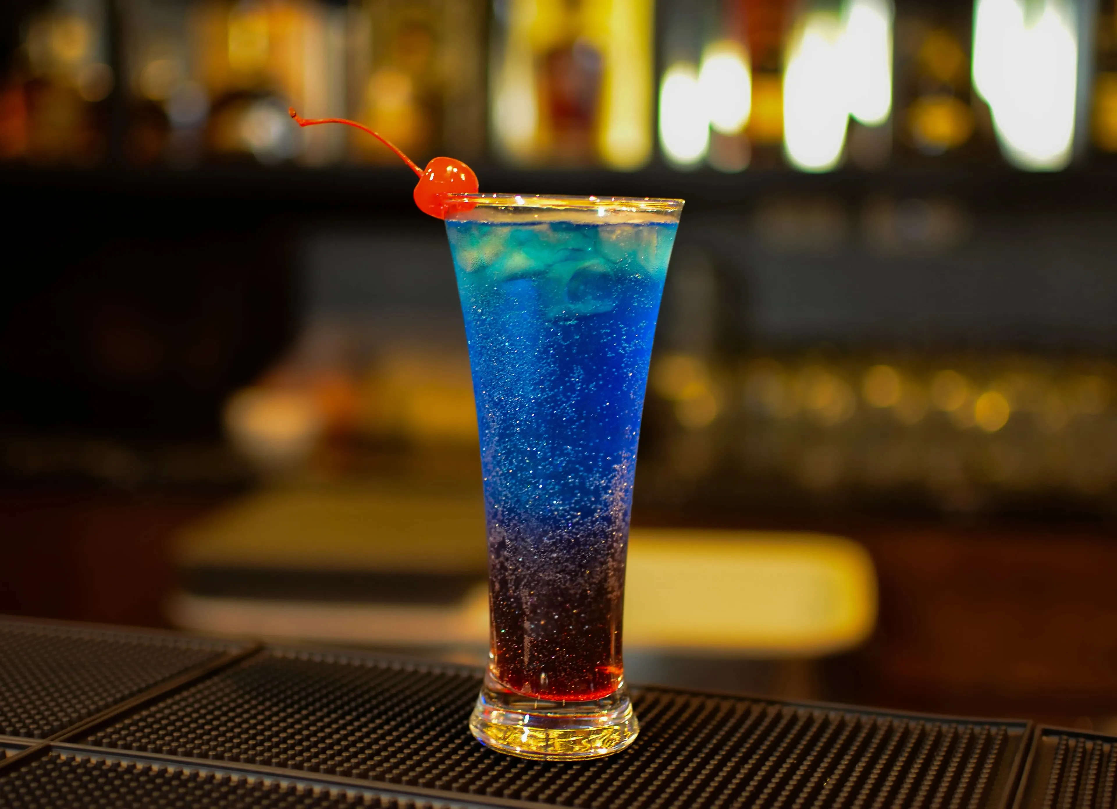 Blue cocktail at the bar
