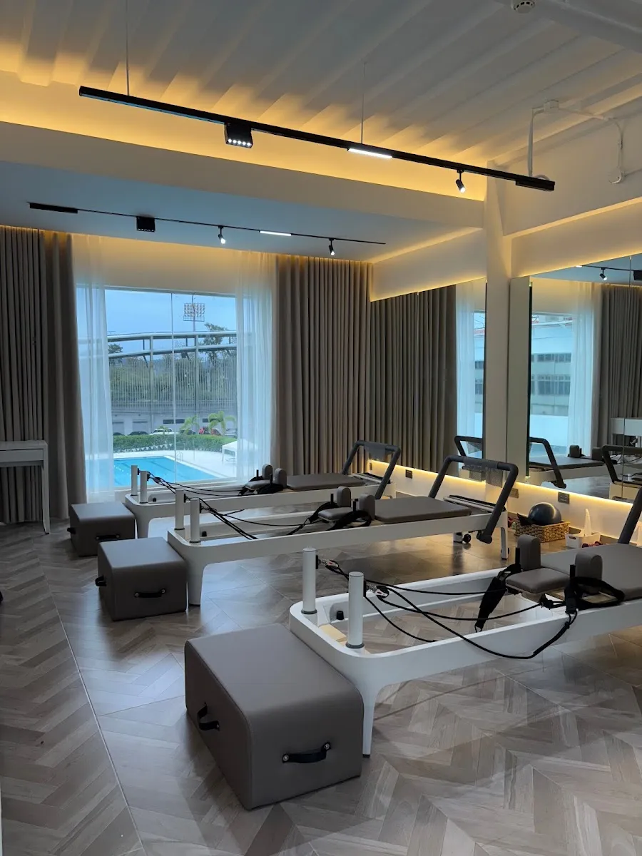 Reformer studio with pool view