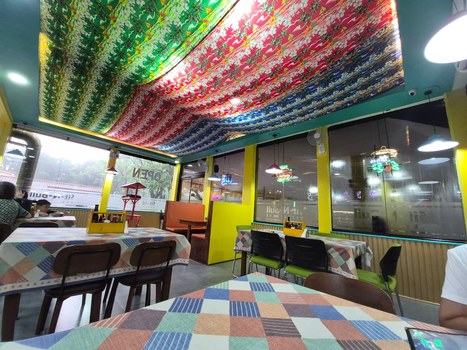Dining area under the patterned ceiling