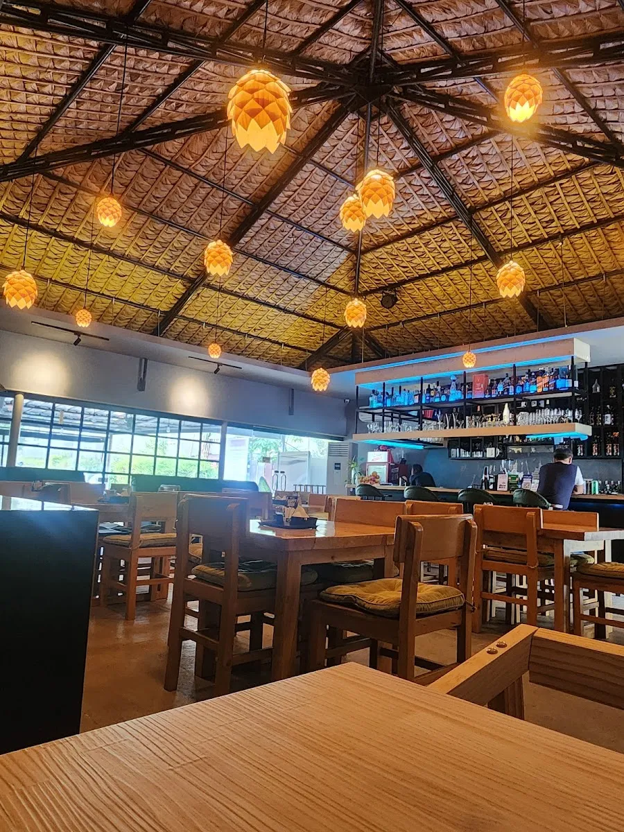 Dining room under lantern-style lights