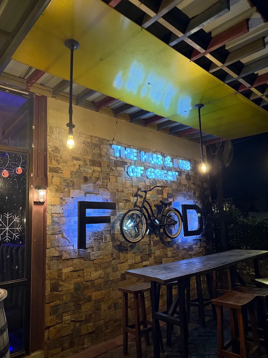 Neon signage above the bar-height tables