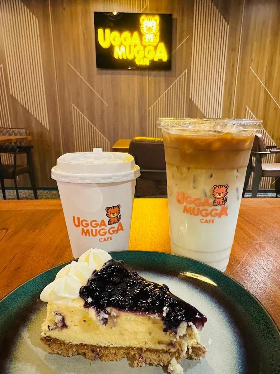 Iced coffees and a blueberry cheesecake slice