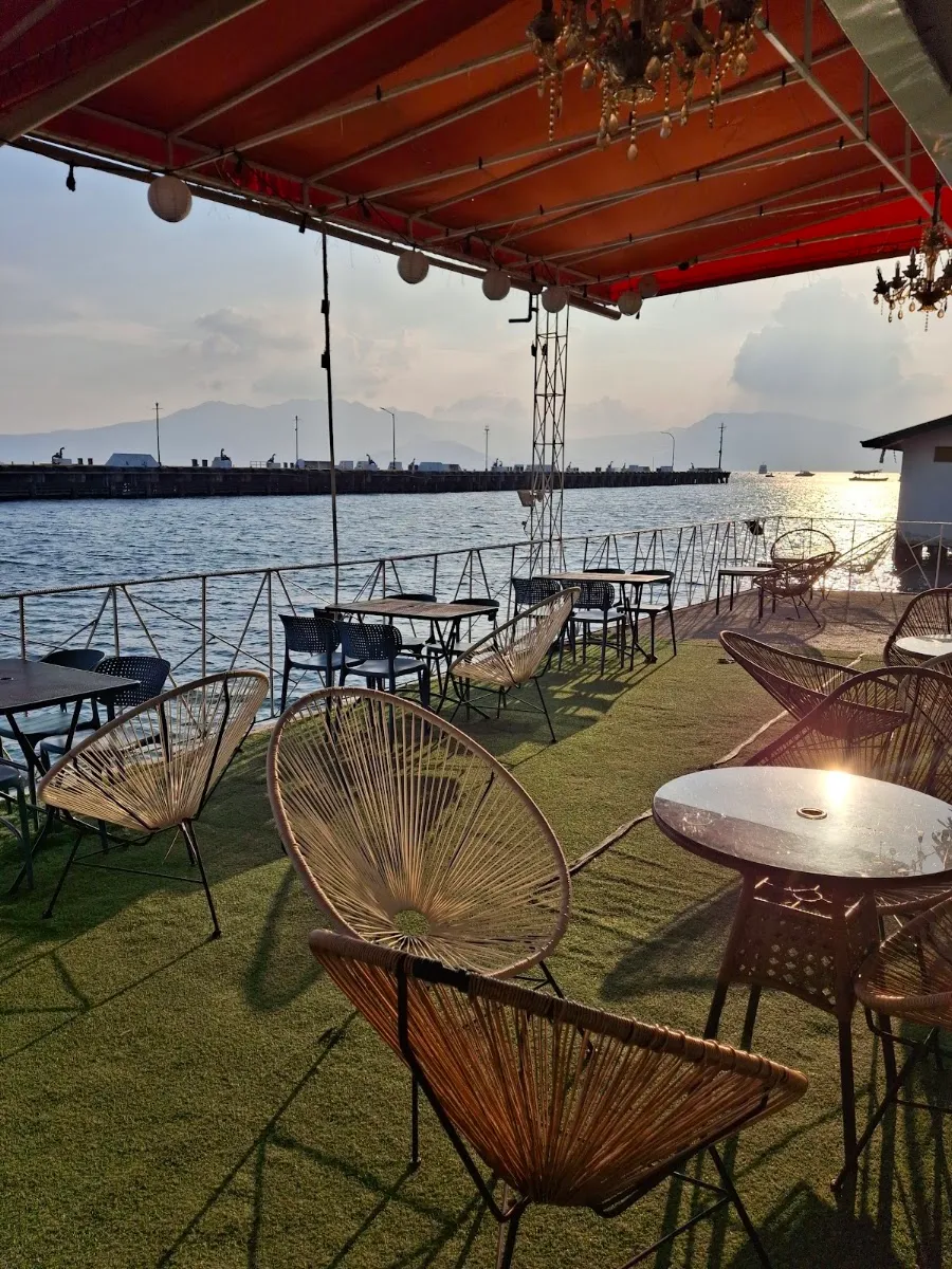 Outdoor seating on the lawn facing the bay