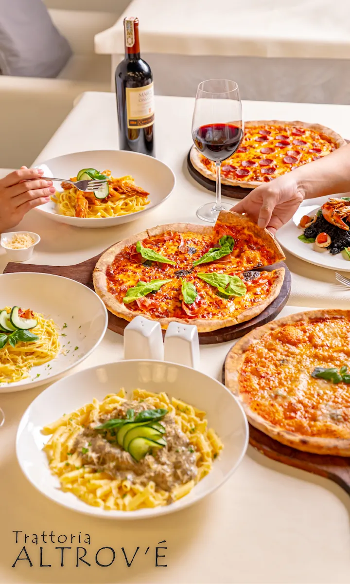 Pasta and pizza spread at the table