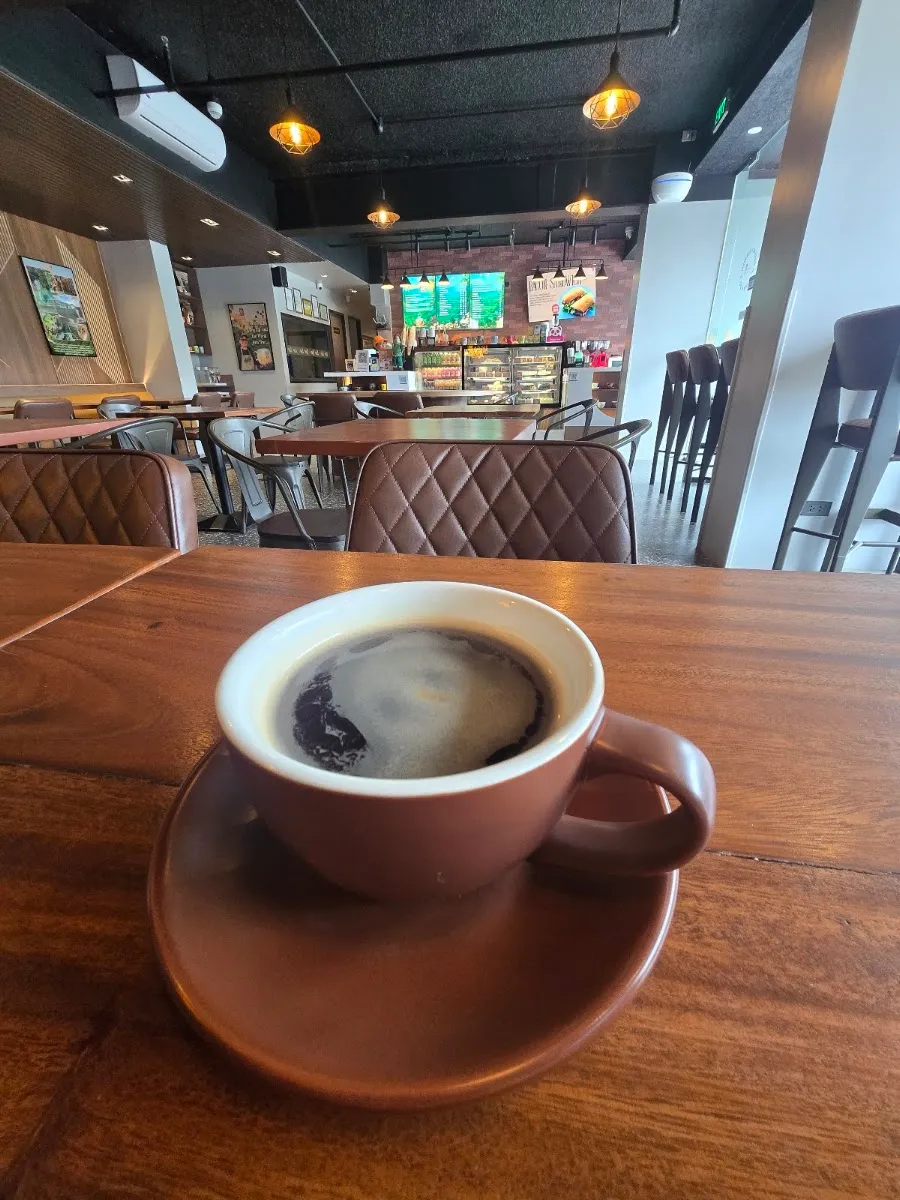 Coffee at a table in the cafe