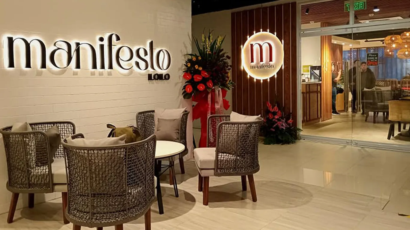 Entrance signage and lounge seating