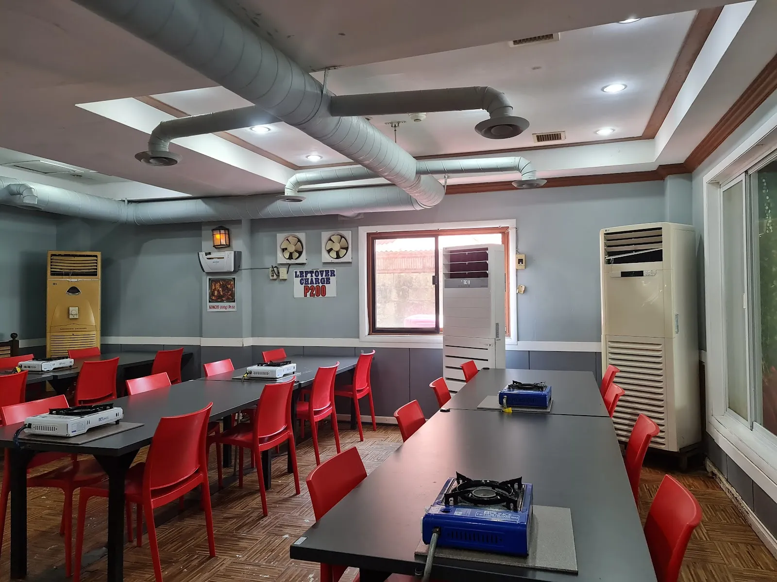 Empty dining room with grill tables