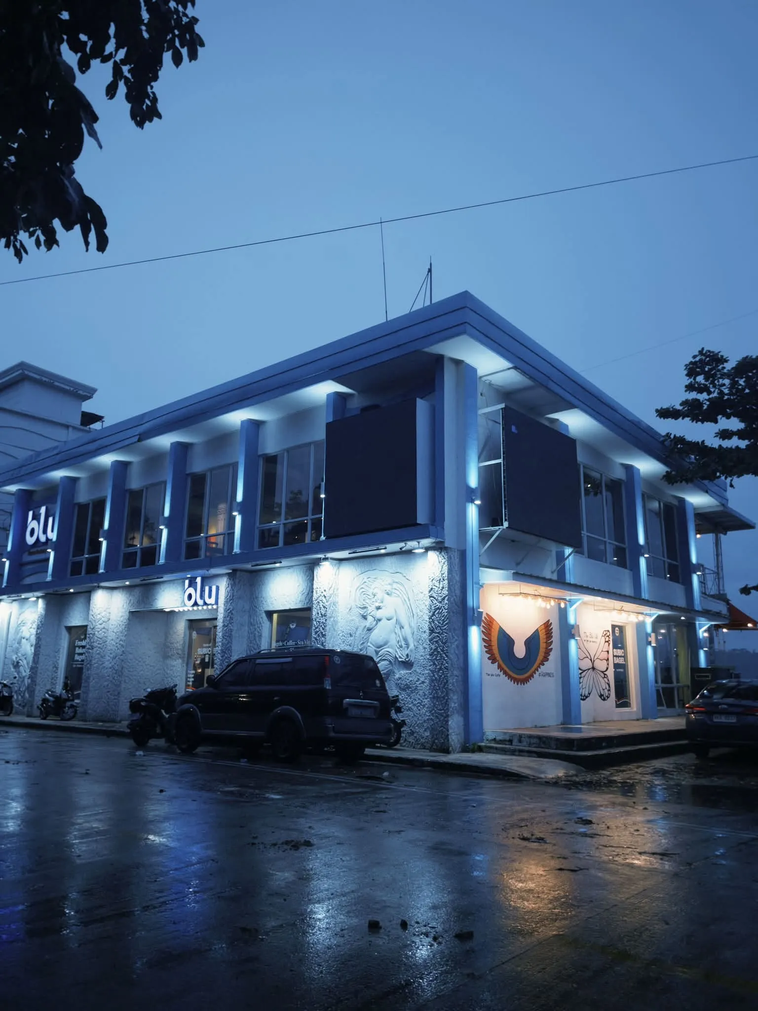 Blu Cafe building at dusk