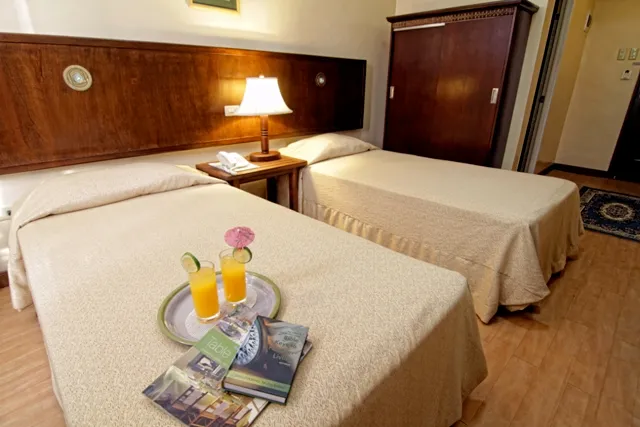 Twin room with breakfast tray