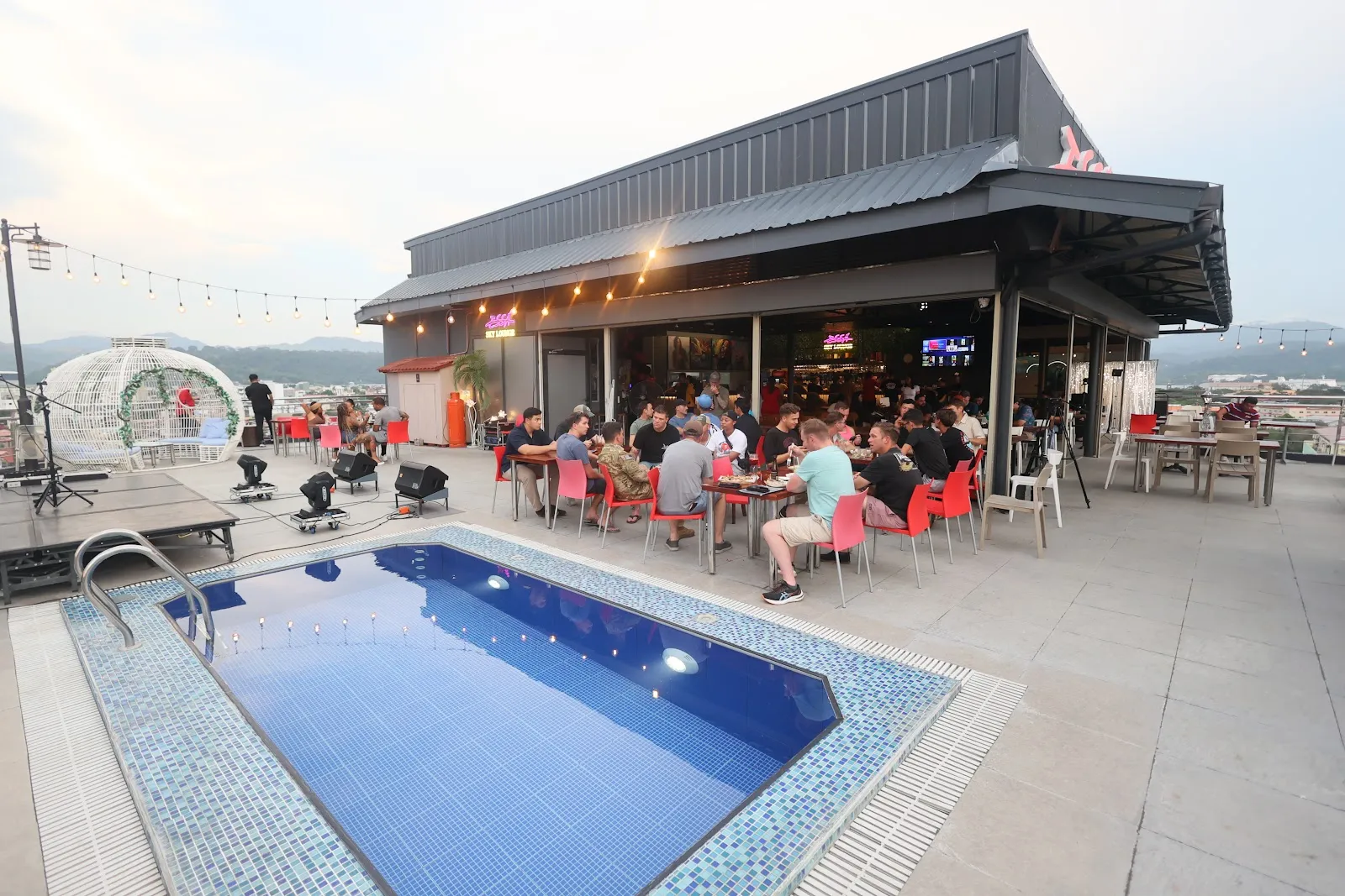 Rooftop pool and lounge seating