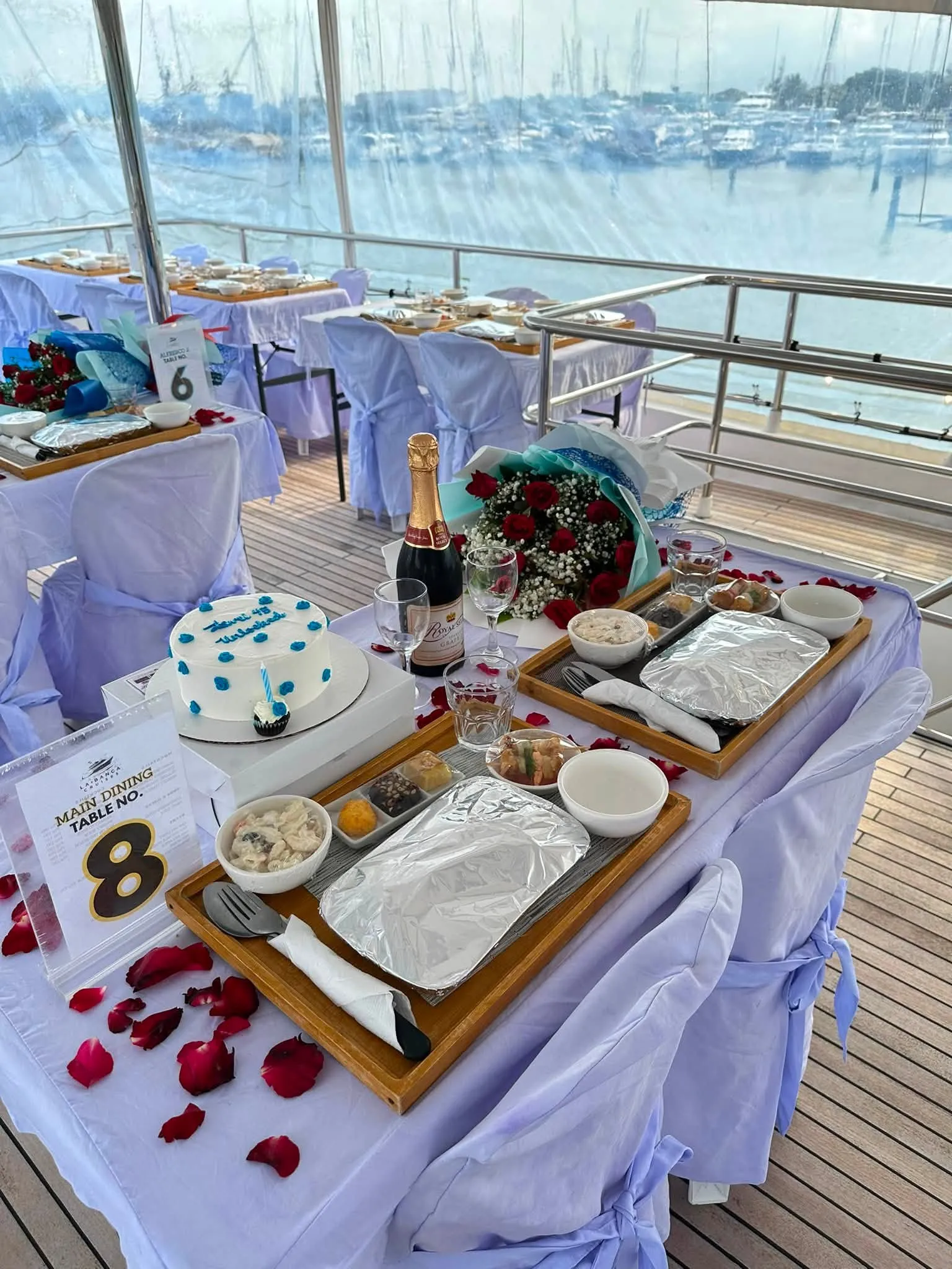 Table set for a celebration on deck